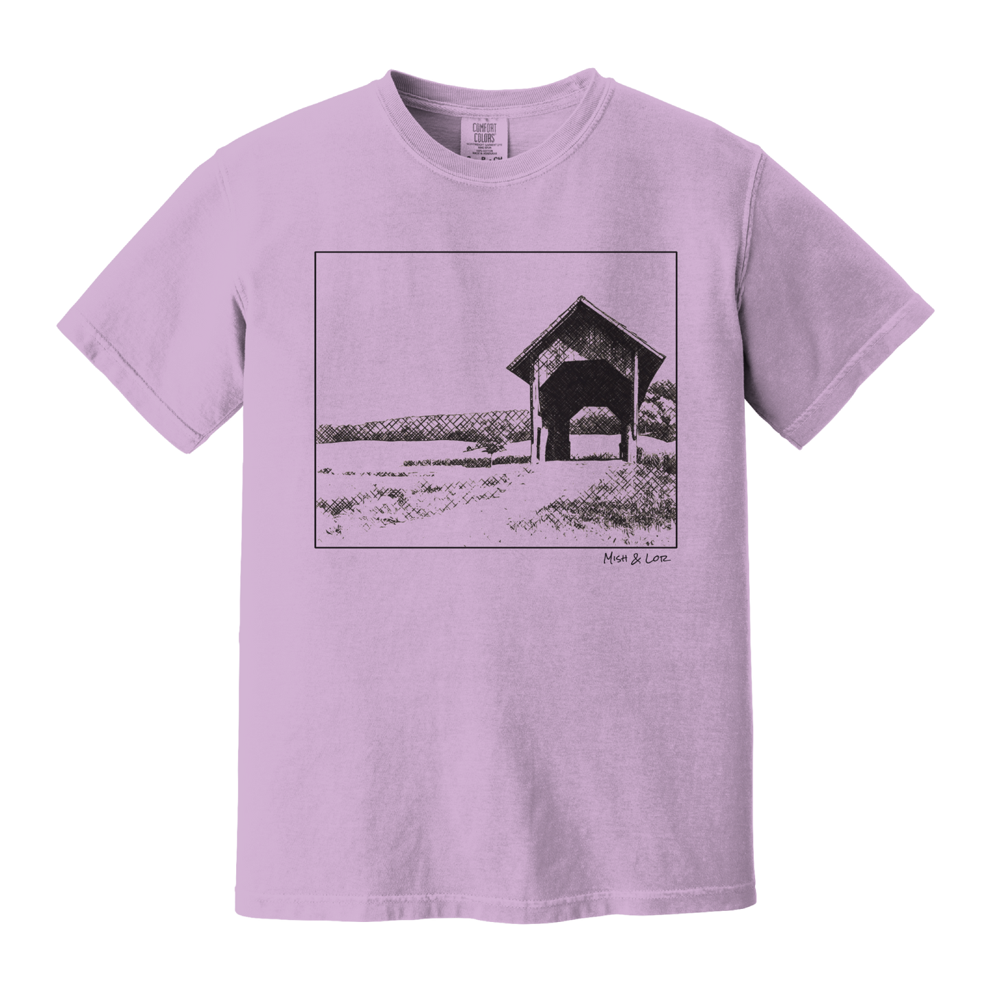 Front view of the Covered Bridge cotton t‑shirt in Orchid (purple), with a storybook scene of a rustic covered bridge arching over a quiet Vermont dirt road.