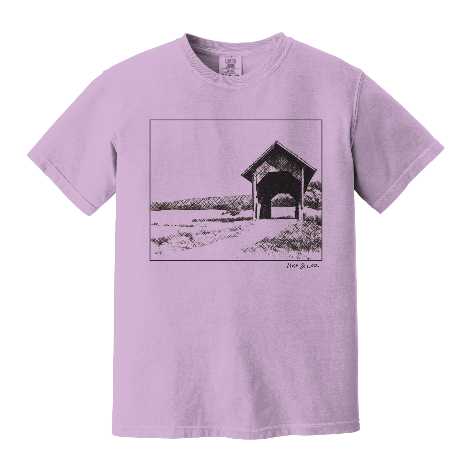 Front view of the Covered Bridge cotton t‑shirt in Orchid (purple), with a storybook scene of a rustic covered bridge arching over a quiet Vermont dirt road.