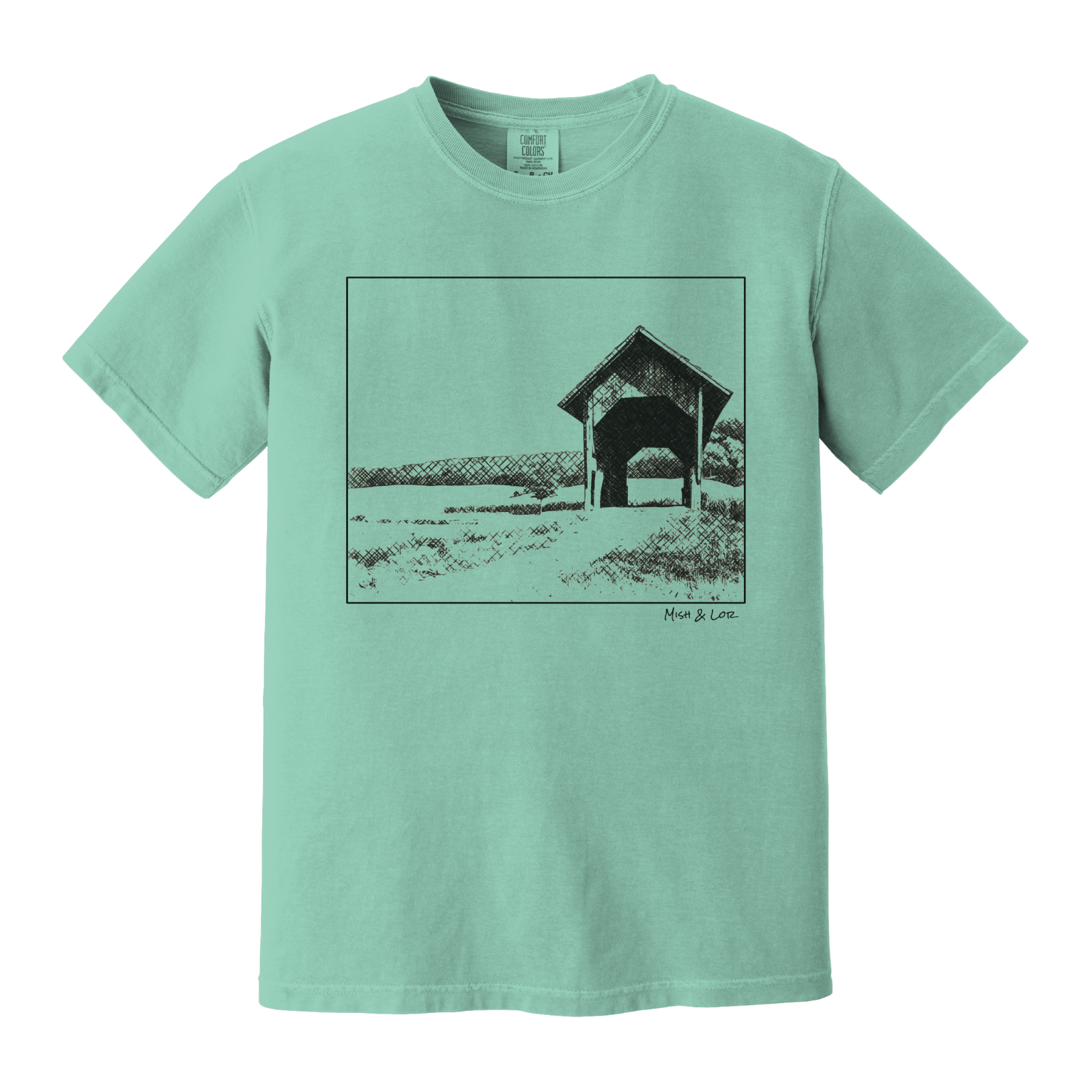 Front view of the Covered Bridge cotton t‑shirt in Seafoam (teal), with a storybook scene of a rustic covered bridge arching over a quiet Vermont dirt road.