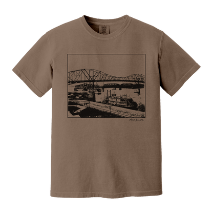 Front view of the Mississippi River Bride Cotton T-Shirt in Espresso (brown), featuring a framed vintage riverfront scene — steel bridges and riverboats rendered in a minimalist, indie-inspired style