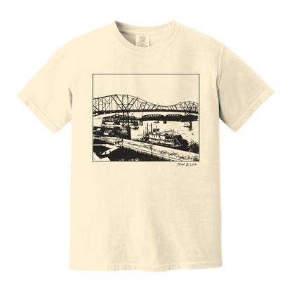 Front view of the Mississippi River Bride Cotton T-Shirt in Ivory (cream), featuring a framed vintage riverfront scene — steel bridges and riverboats rendered in a minimalist, indie-inspired style