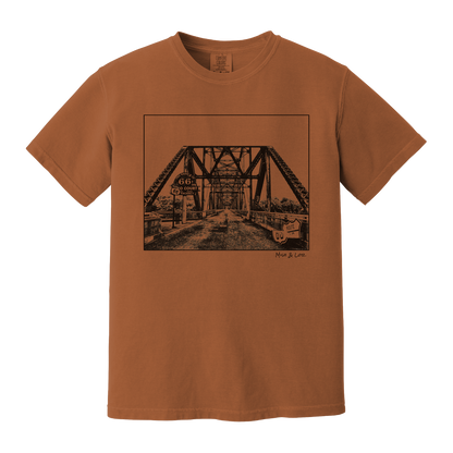 Front view of the Old Route 66 cotton t-shirt in Yam (orange), featuring a weathered industrial-style bridge and road graphic